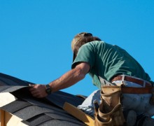 Man making fixes on the roof