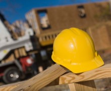 Hard hat on wood plank